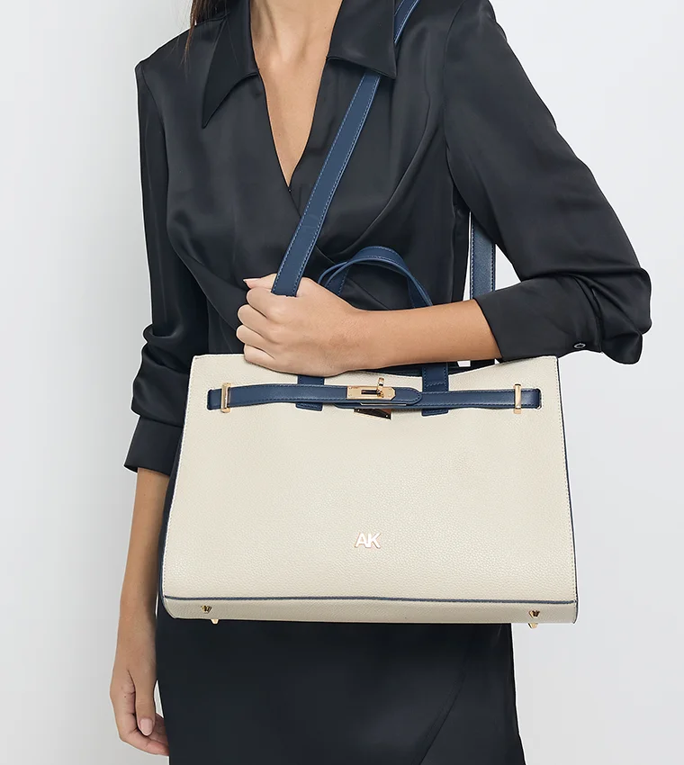 آن كلاين طقم حقيبة يد توت من آن كلاين بتفاصيل متباينة من جلد البولي يوريثان